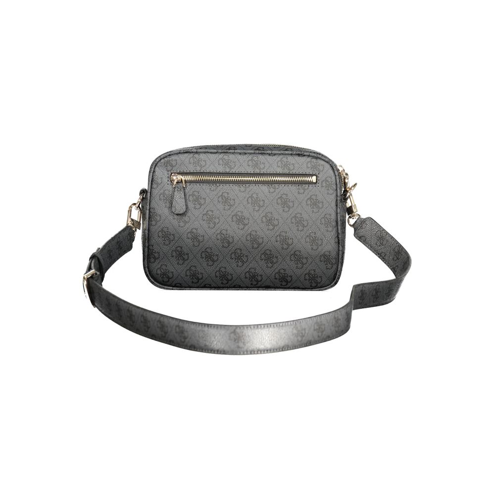 Handbag by Guess Jeans for women in polyurethane leather black features a signature silhouette, showcasing a secure snap & zipper and signature external-pockets & internal-pockets with versatile shoulder-strap, adjustable-strap & detachable-strap for a sophisticated look.