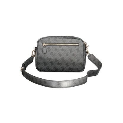 Handbag by Guess Jeans for women in polyurethane leather black features a signature silhouette, showcasing a secure snap & zipper and signature external-pockets & internal-pockets with versatile shoulder-strap, adjustable-strap & detachable-strap for a sophisticated look.