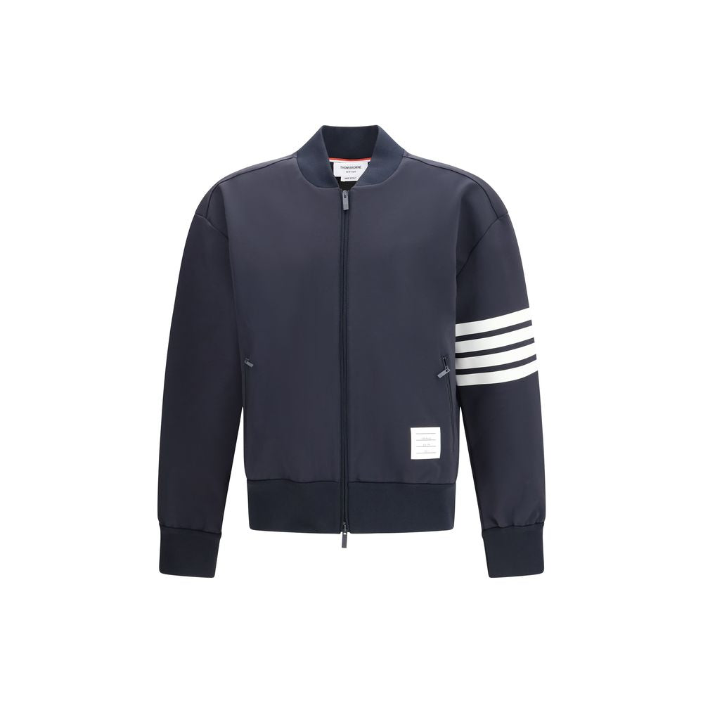 Bomber Jacket by Thom Browne for men in stretch polyamide viscose blue features a dramatic silhouette, showcasing a sophisticated and distinctive pockets for a dramatic aesthetic.