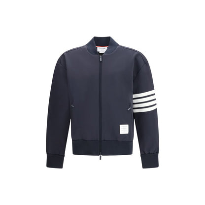 Bomber Jacket by Thom Browne for men in stretch polyamide viscose blue features a dramatic silhouette, showcasing a sophisticated and distinctive pockets for a dramatic aesthetic.