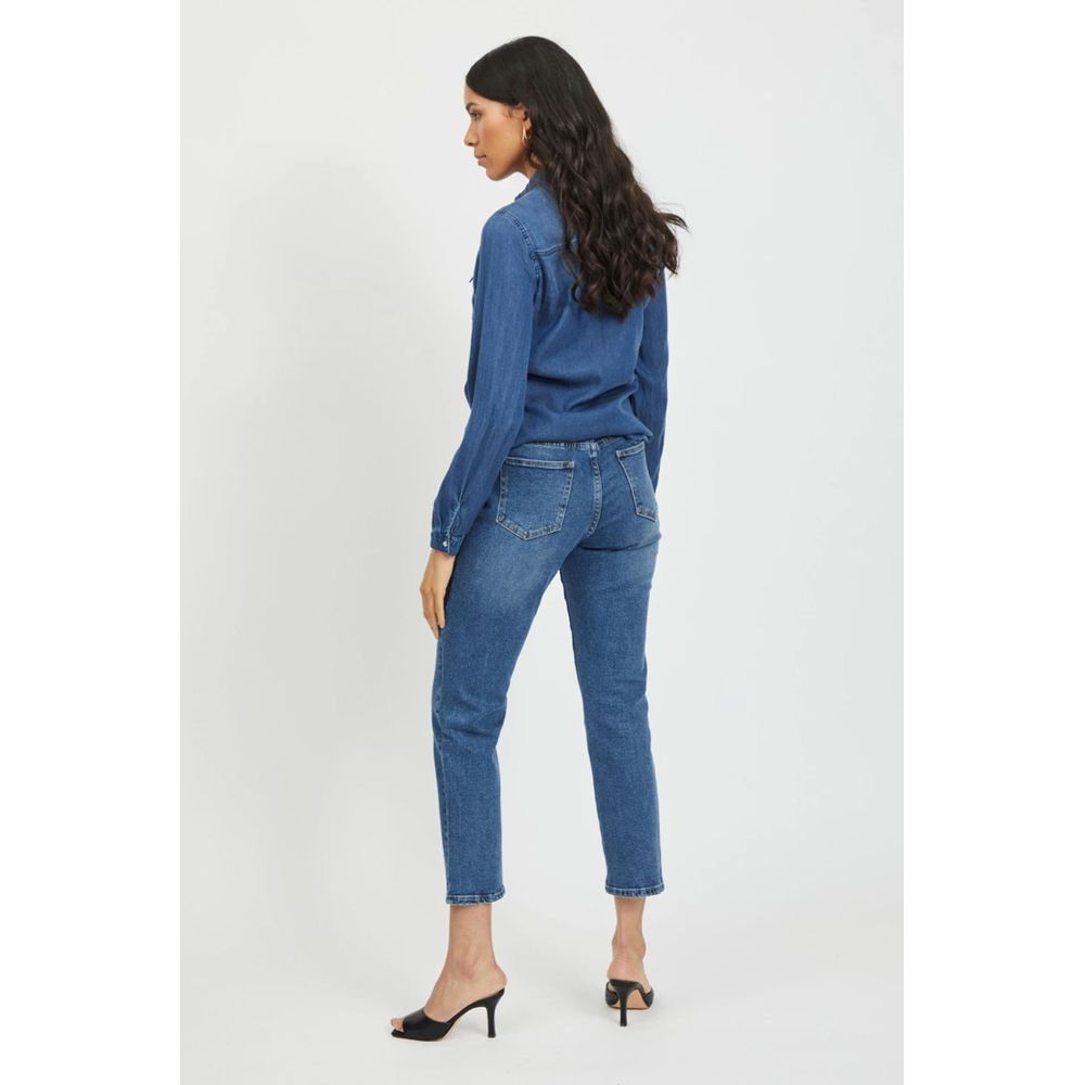 Shirt by Vila Clothes for women in lyocell & cotton blue showcases a sharp silhouette, elegantly detailed with a sharp and sharp .