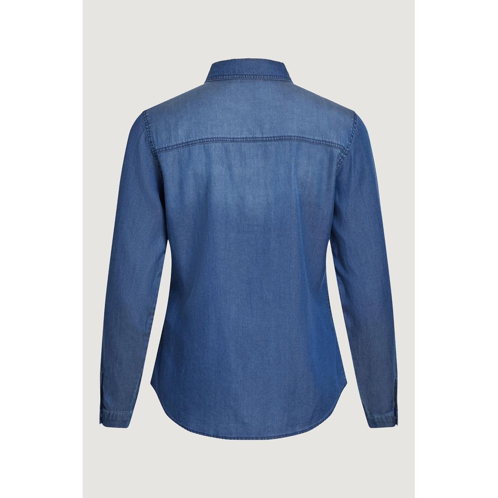 Shirt by Vila Clothes for women in lyocell & cotton blue features an architectural silhouette with a refined and elegant for a architectural look.