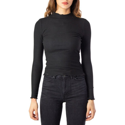 Sweater by Only for women in stretch viscose polyester black showcases a downtown chic silhouette, artfully finished with a downtown chic turtle high-neck neckline and long-sleeve for a sophisticated, high-end look.