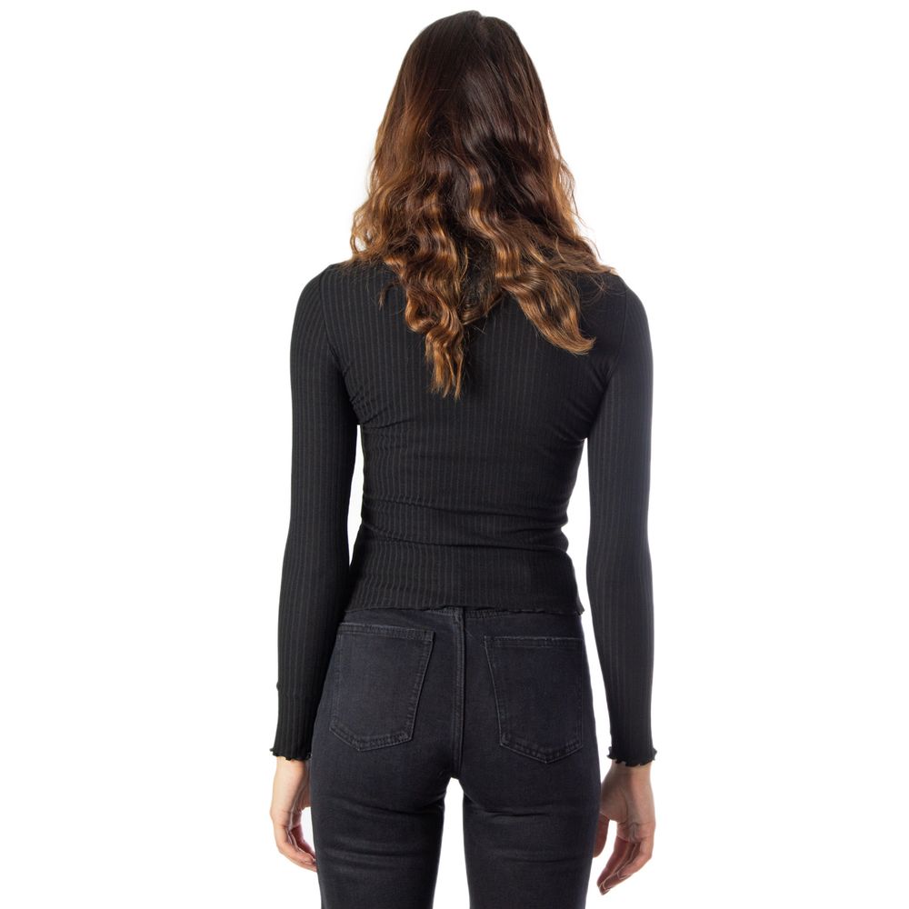 Sweater by Only for women in stretch viscose polyester black features an polished silhouette, showcasing refined and a sophisticated turtle high-neck neckline for a truly polished finish.