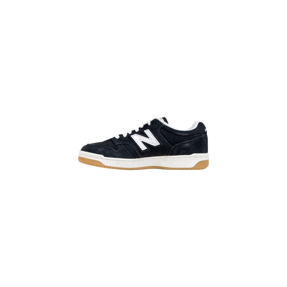 Sneakers by New Balance for women in leather & rubber black & white features an sumptuous silhouette, showcasing the premium Women's Athletic Casual Leather & Rubber Sneakers in a sumptuous athletic casual style that offers a sumptuous finish for refined style.