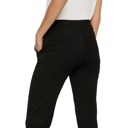 Trousers by Vero Moda for women in stretch viscose polyester black presents a smart silhouette, meticulously detailed with a smart straight-leg & regular-fit, a smart long, and a smart .