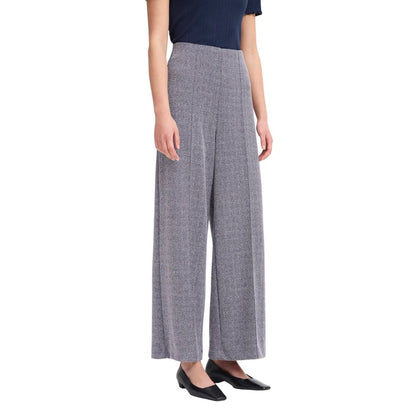 Trousers by ICHI for women in stretch polyester & viscose blue presents a perennial silhouette, meticulously tailored with a straight-leg & wide cut, long finish, and an elegant high rise.