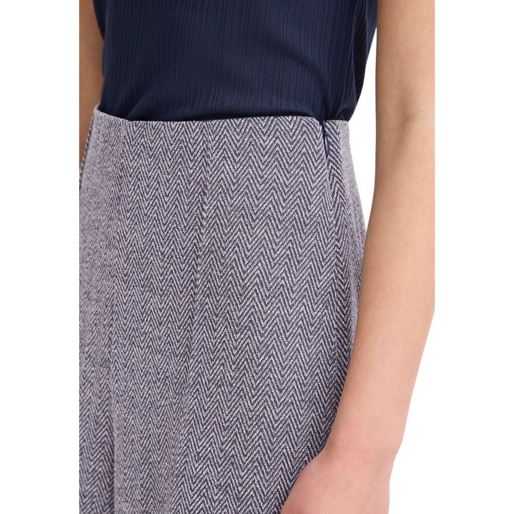 Trousers by ICHI for women in stretch polyester & viscose blue presents a smart silhouette, meticulously detailed with a smart straight-leg & wide, a smart long, and a smart high rise.