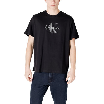 T-Shirt by Calvin Klein Jeans for men in cotton black showcases a dramatic silhouette, elegantly detailed with a dramatic and for a truly dramatic finish.