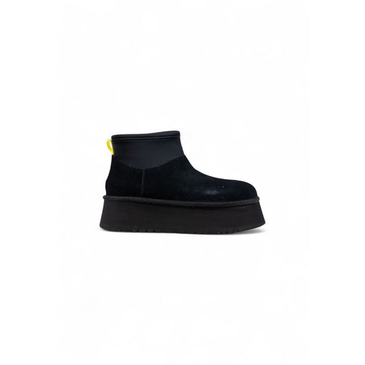 Ankle Boots by UGG for women in suede leather & rubber black showcases a aeronautic silhouette as Women's Suede Leather & Rubber Ankle Boots, artfully defined by a aeronautic and a aeronautic .