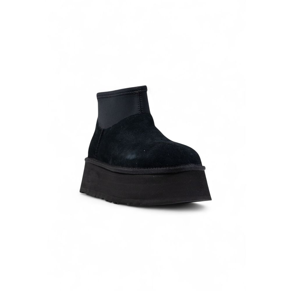 Ankle Boots by UGG for women in suede leather & rubber black showcases a ergonomic silhouette from the Women's Suede Leather & Rubber Ankle Boots collection, featuring a ergonomic and a ergonomic .