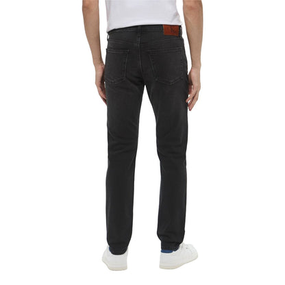 Jeans by Calvin Klein Jeans for men in stretch denim cotton black presents a refined pantology silhouette, artfully defined by a refined pantology skinny & slim, long, and a sophisticated .