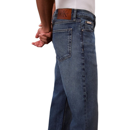 Jeans by Calvin Klein Jeans for men in stretch denim cotton blue & natural presents a tailored silhouette, showcasing a tailored relaxed-fit & regular-fit and long cut with a refined for a truly tailored aesthetic.
