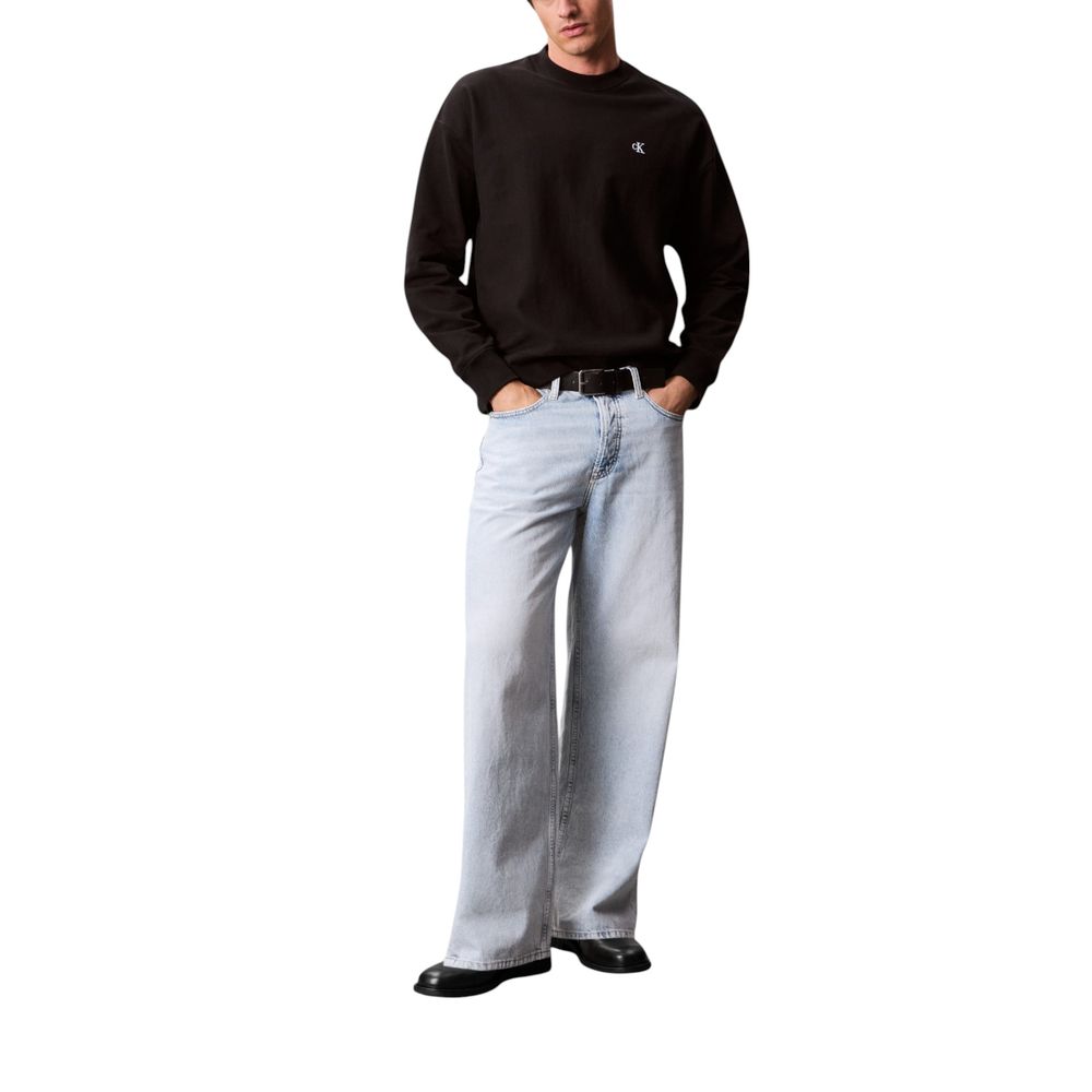 Activewear Sweatshirt by Calvin Klein Jeans for men in polyester cotton terrycloth black showcases a versatile silhouette, artfully detailed with a versatile crew neckline and for a versatile finish with .