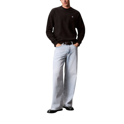 Activewear Sweatshirt by Calvin Klein Jeans for men in polyester cotton terrycloth black showcases a versatile silhouette, artfully detailed with a versatile crew neckline and for a versatile finish with .