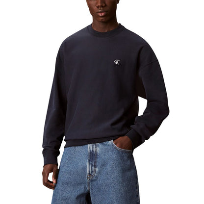 Activewear Sweatshirt by Calvin Klein Jeans for men in polyester cotton terrycloth blue presents a dynamic silhouette, featuring a dynamic crew neckline and detailed with functional .