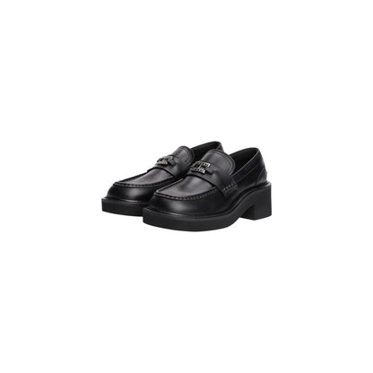 High-Heel Loafers Pumps Heels by Tommy Hilfiger Jeans for women in leather and black showcases a effortlessly elegant silhouette as Women's Leather High-Heel Loafers Pumps Heels, featuring a effortlessly elegant high-heel and a effortlessly elegant for an elegant look.