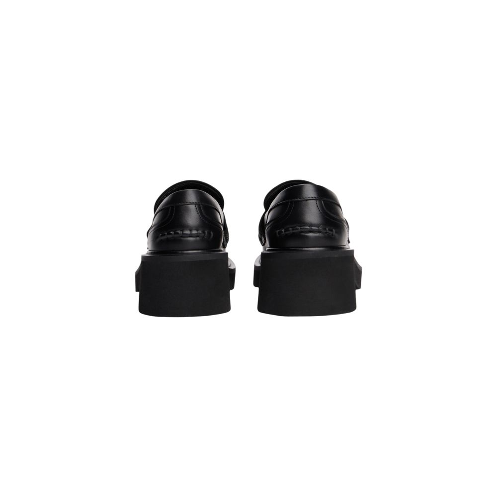 High-Heel Loafers Pumps Heels by Tommy Hilfiger Jeans for women in leather black features an effortlessly chic silhouette, showcasing the elegant Women's Leather High-Heel Loafers Pumps Heels design with a high-heel and a sophisticated .