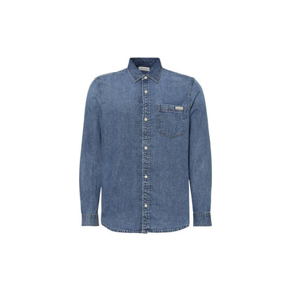 Shirt by Calvin Klein Jeans for men in denim cotton blue showcases a sleek silhouette, elegantly detailed with a sleek round neckline and long-sleeve for a sleek finish.