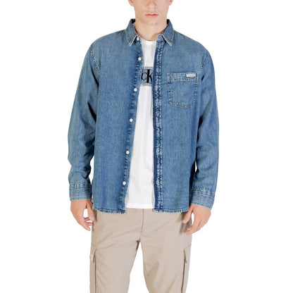 Shirt by Calvin Klein Jeans for men in denim cotton blue presents a discerning silhouette, showcasing a sophisticated round neckline and for a truly discerning finish.