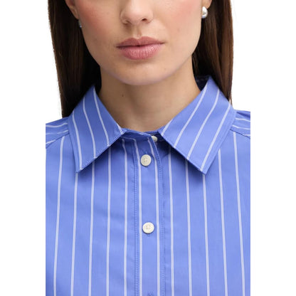 Shirt by Calvin Klein Jeans for women in cotton blue showcases a sublime silhouette, artfully detailed with a sublime and for a sophisticated, sublime finish.