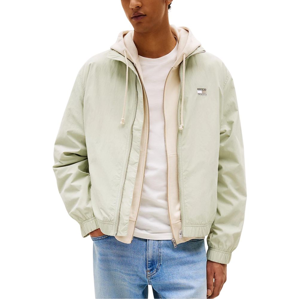 This Bomber Jacket by Tommy Hilfiger Jeans for men in polyamide exhibits a edgy silhouette, meticulously detailed with functional and a edgy high-collar neckline for a edgy finish.