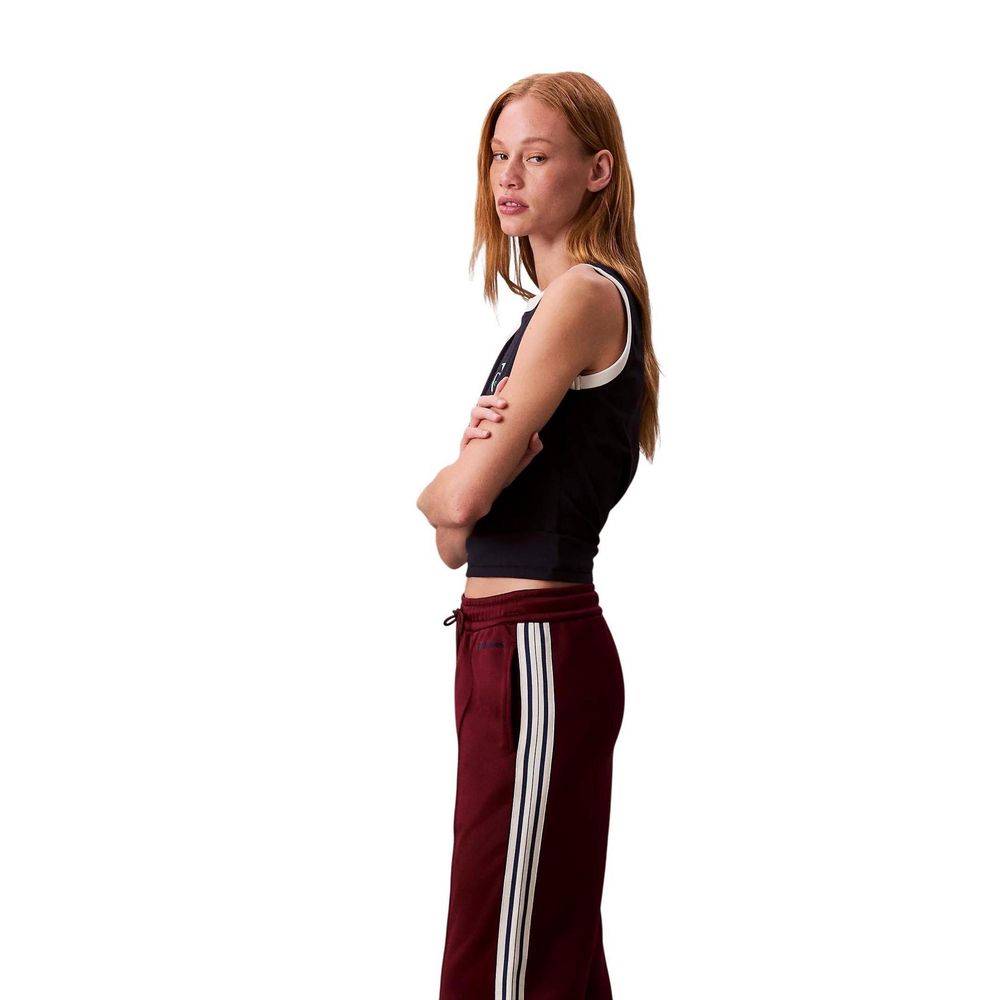 Activewear Jogger Pants by Calvin Klein Jeans for women in cotton polyester bordeaux features a versatile silhouette, integrating performance breathable-design with a versatile straight-leg, long, and comfortable .