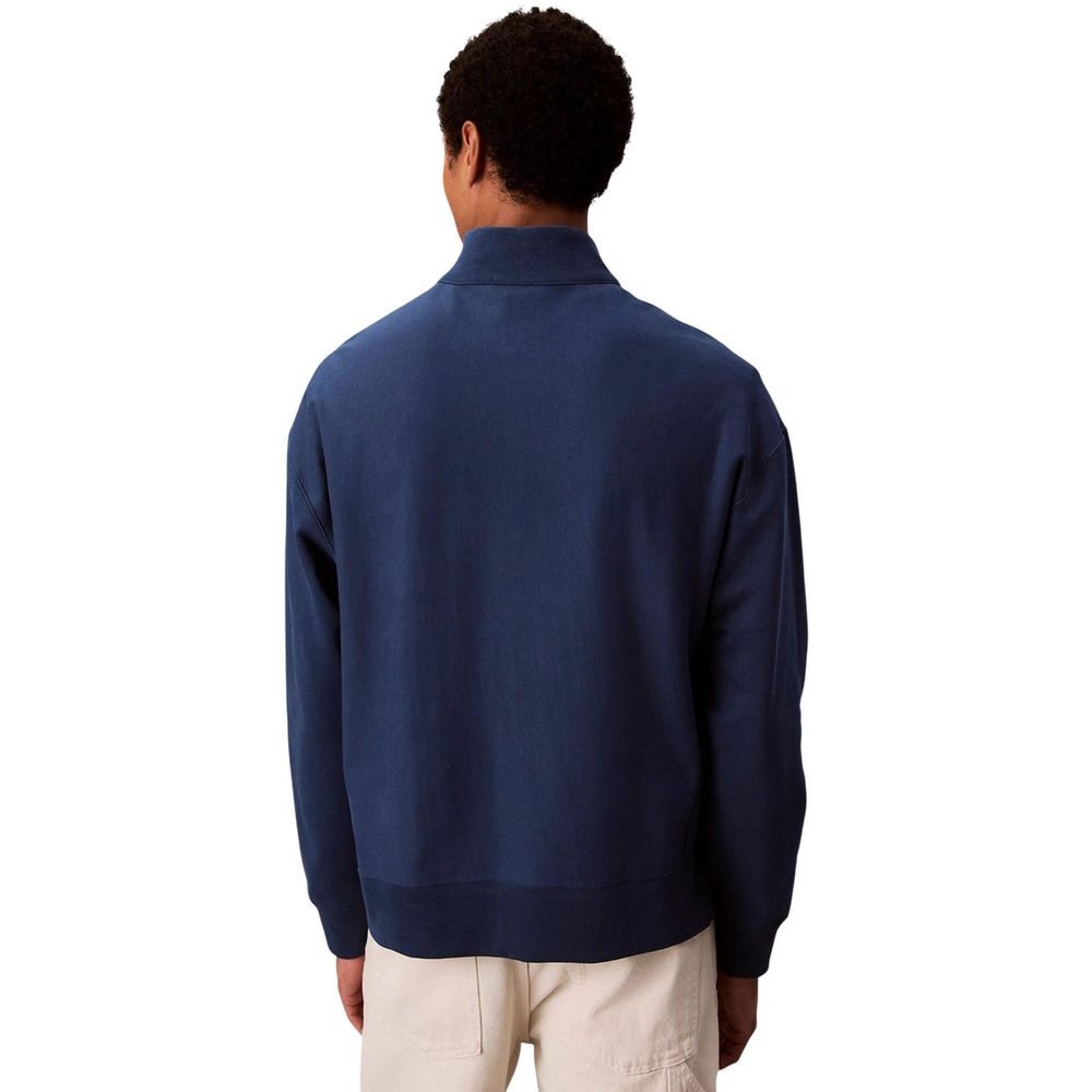 Activewear Sweatshirt by Calvin Klein Jeans for men in polyester cotton terrycloth blue presents a sporty silhouette, showcasing a sophisticated high-collar neckline and detailed with premium for a sporty finish.