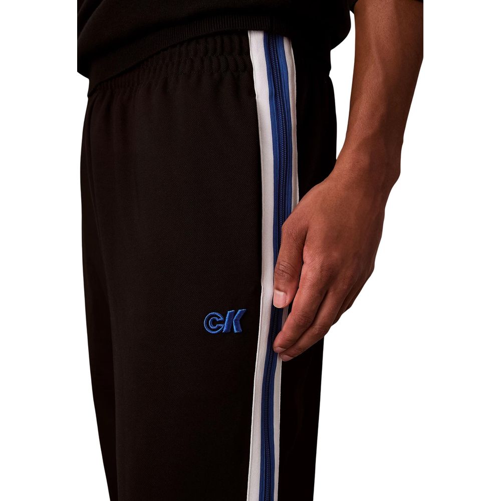 Activewear Jogger Pants by Calvin Klein Jeans for men in stretch polyester twill black & striped features a versatile silhouette, integrating performance with a versatile straight-leg, long, and comfortable .