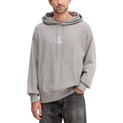 Hooded Hoodie by Calvin Klein Jeans for men in cotton terrycloth & polyester gray showcases a city-ready silhouette, artfully detailed with a signature hooded neckline and for a city-ready finish.