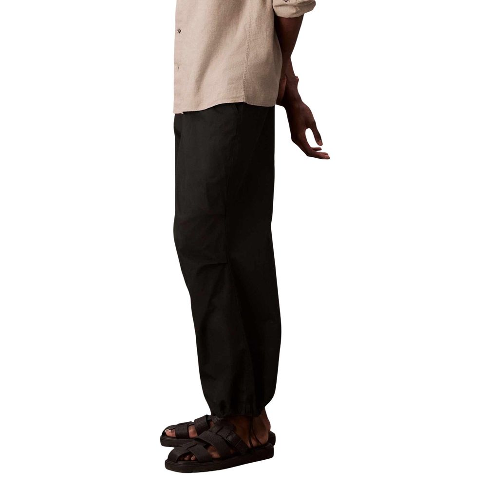 Activewear Jogger Pants by Calvin Klein Jeans for men in nylon cotton black features an kinetic and long with a , showcasing high-performance breathable-design for an kinetic look.