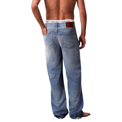 Jeans by Calvin Klein Jeans for men in viscose & denim blue presents a tailored silhouette, showcasing a tailored relaxed-fit, regular-fit & wide and long cut with a refined for a truly tailored aesthetic.