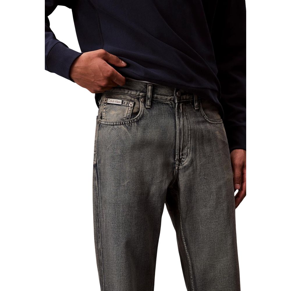 Jeans by Calvin Klein Jeans for men in denim cotton & acetate beige features an refined tailoring silhouette, showcasing a premium straight-leg, relaxed-fit & regular-fit with a and long cut for a refined tailoring look.