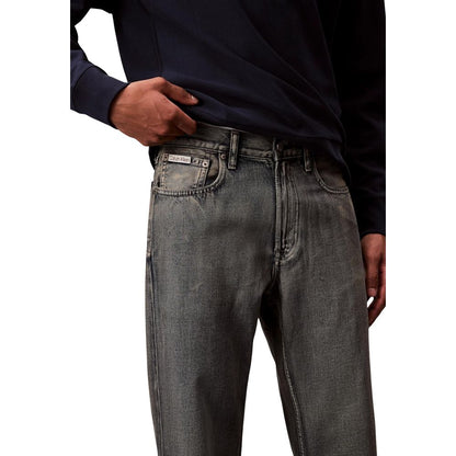 Jeans by Calvin Klein Jeans for men in denim cotton & acetate beige features an refined tailoring silhouette, showcasing a premium straight-leg, relaxed-fit & regular-fit with a and long cut for a refined tailoring look.