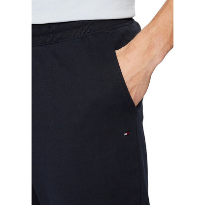 Activewear Jogger Pants by Tommy Hilfiger for men in cotton terrycloth blue & natural features a contemporary silhouette with , a contemporary regular-fit, long hem, and for a premium, high-performance aesthetic.