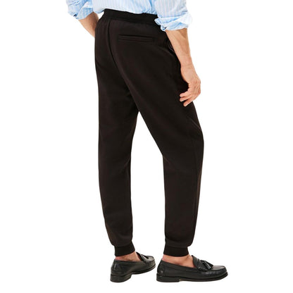 Activewear Jogger Pants by Tommy Hilfiger for men in cotton polyester black features an kinetic regular-fit and long with a , showcasing high-performance for an kinetic look.
