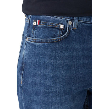 Jeans by Tommy Hilfiger for men in stretch denim cotton blue features a refined silhouette with a refined straight-leg, relaxed-fit & regular-fit, defined by a and a refined long for a refined finish.