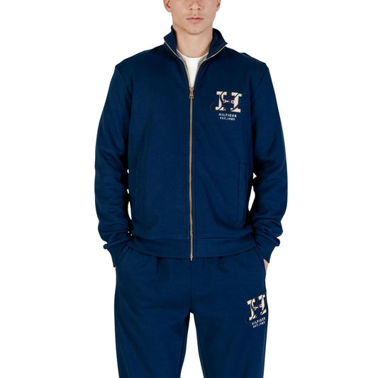 Activewear Sweatshirt by Tommy Hilfiger for men in cotton polyester blue showcases a athletic silhouette with sleeves, a athletic hooded high-collar neckline, and high-performance for a athletic aesthetic.