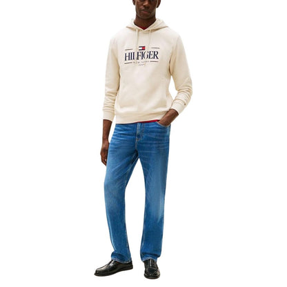 Hooded Hoodie by Tommy Hilfiger for men in oranic cotton & polyester beige features a authentic silhouette, showcasing a sophisticated hooded neckline and authentic detail for a refined finish.