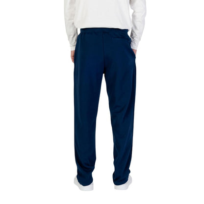 Activewear Jogger Pants by Tommy Hilfiger for men in cotton polyester blue features an kinetic regular-fit and long with a , showcasing high-performance for an kinetic look.