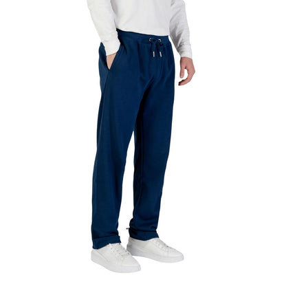 Activewear Jogger Pants by Tommy Hilfiger for men in cotton polyester blue features an sporty regular-fit with a and long, showcasing sporty .