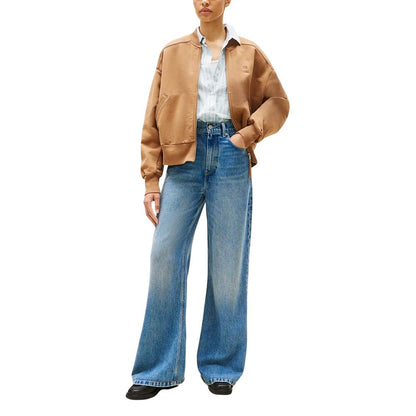 Jeans by Tommy Hilfiger for women in lana wool & denim blue features an refined tailoring silhouette, showcasing a premium flared, bootcut & wide with a high rise and long cut for a refined tailoring look.