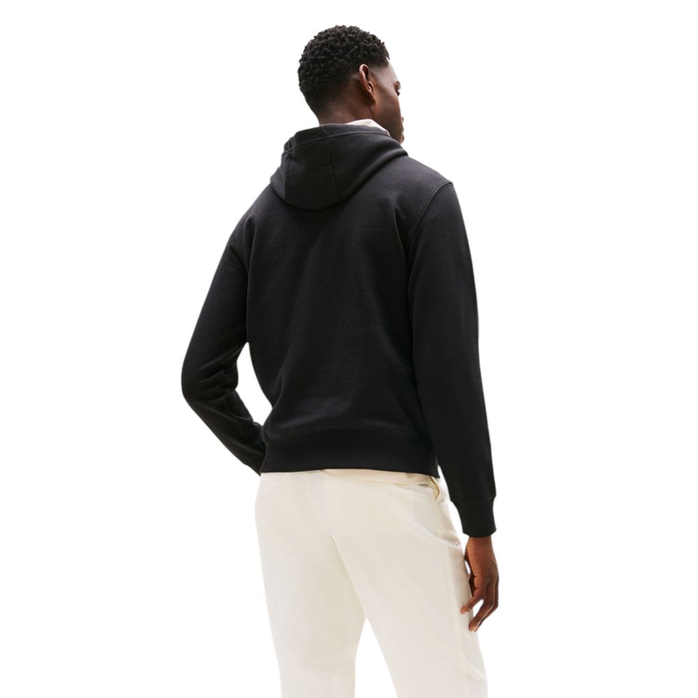 Hooded Hoodie by Tommy Hilfiger for men in cotton & kangaroo black & natural showcases a city-ready silhouette, artfully detailed with a signature hooded neckline and for a city-ready finish.