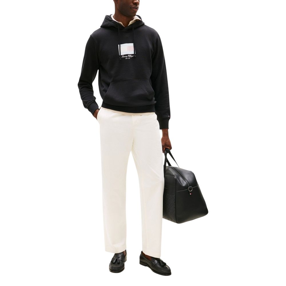 Hooded Hoodie by Tommy Hilfiger for men in cotton & kangaroo black & natural features a authentic silhouette, showcasing a sophisticated hooded neckline and authentic detail for a refined finish.