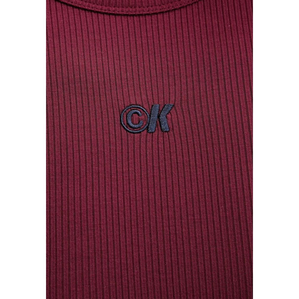 Dress by Calvin Klein Jeans for women in stretch lycra & modal bordeaux features an eye catching silhouette with a sophisticated , elegant , and a refined short long for a eye catching aesthetic.