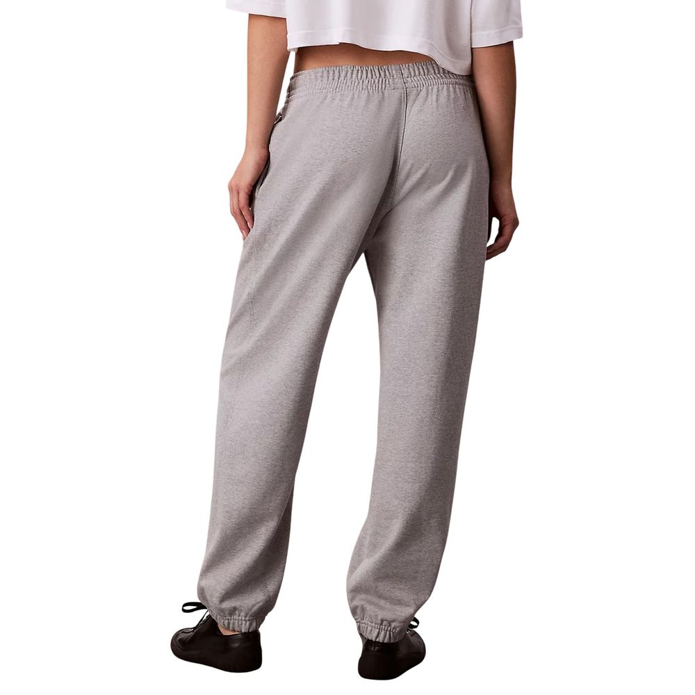Activewear Jogger Pants by Calvin Klein Jeans for women in cotton polyester gray features an kinetic relaxed-fit and long with a , showcasing high-performance for an kinetic look.