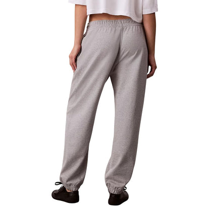 Activewear Jogger Pants by Calvin Klein Jeans for women in cotton polyester gray features an kinetic relaxed-fit and long with a , showcasing high-performance for an kinetic look.