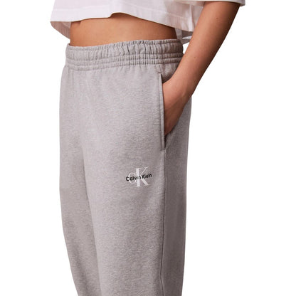 Activewear Jogger Pants by Calvin Klein Jeans for women in cotton polyester gray features an ergonomic relaxed-fit and with a ergonomic long, showcasing innovative for a ergonomic look.