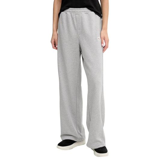 Activewear Jogger Pants by Calvin Klein Jeans for women in cotton terrycloth gray features a versatile silhouette, integrating performance with a versatile relaxed-fit & wide, long, and comfortable .
