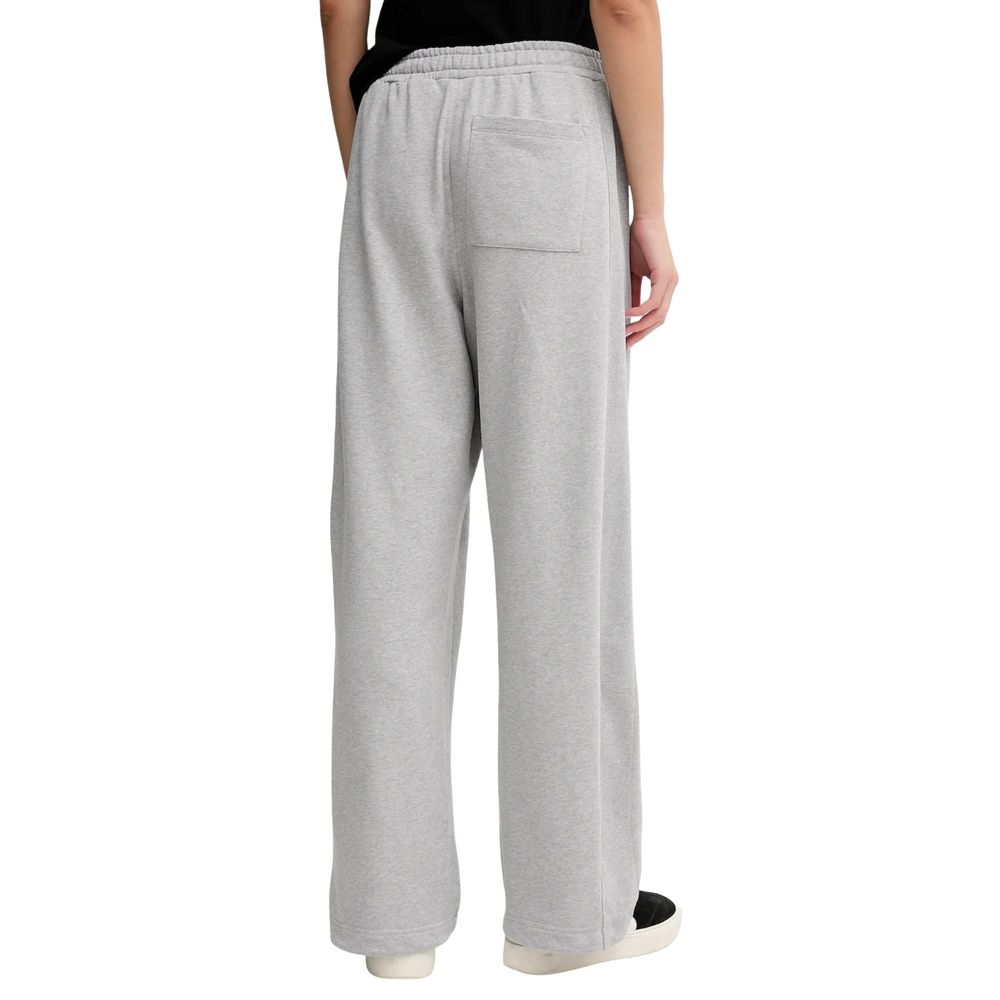Activewear Jogger Pants by Calvin Klein Jeans for women in cotton terrycloth gray features an ergonomic relaxed-fit & wide and with a ergonomic long, showcasing innovative for a ergonomic look.